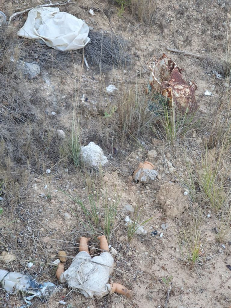 waste on the ground that could have been recycled in a green point